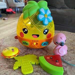 Fisher-Price Paradise Pals Magical Lights & Tunes Pineapple Baby Toy